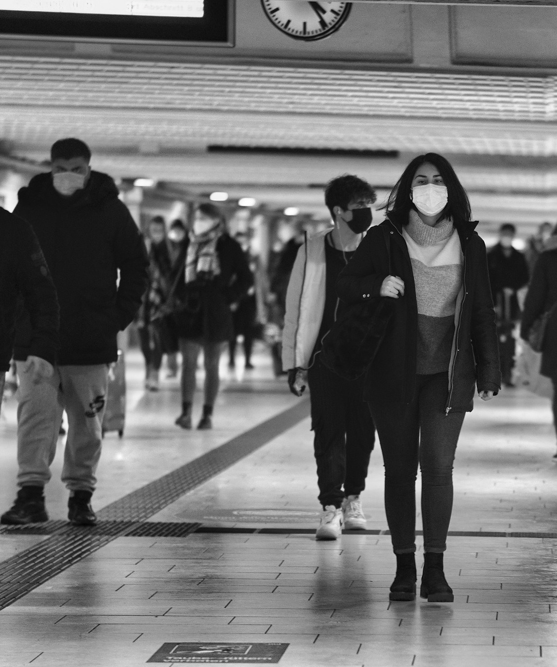 People walking with masks portrait_1